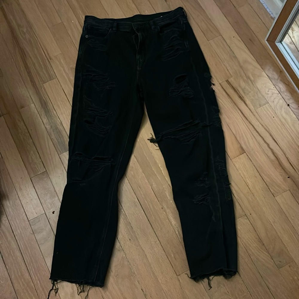holes in the back and front, back holes are lower on the leg